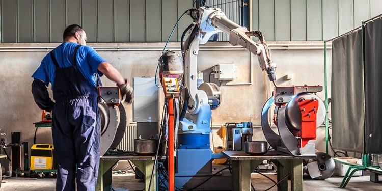 How Collaborative Robots Work with Human Workers to Provide a More Flexible and Safe Production Model, Transforming Traditional Manufacturing Processes