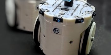 Bionic Robots Mimicking Collective Behavior: Leveraging Swarm Intelligence and Distributed Control Systems